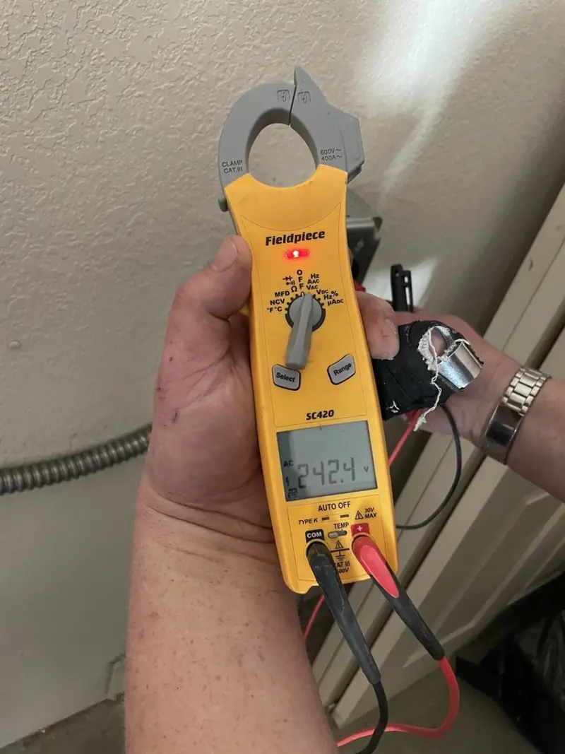 Voltage testing with clamp meter during Electrical Installation Services in Granite Shoals